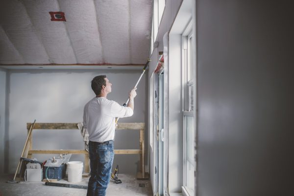 Painter decorator working inside building